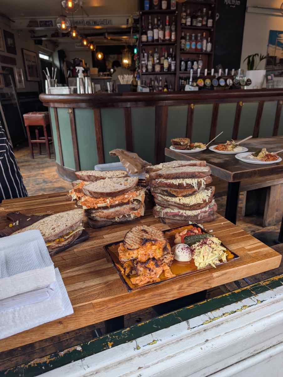 Stacks of toasties on wooden boards ready to be served